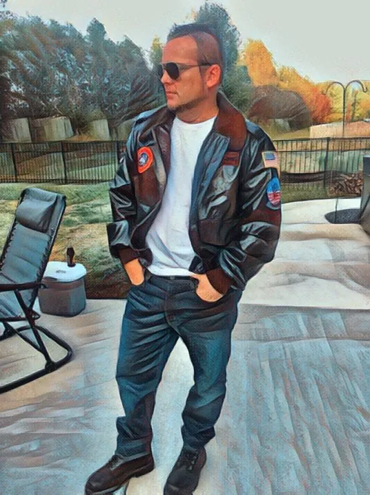 Sean Redenbaugh in a leather flight jacket and sunglasses